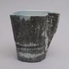 "Into the Woods: Woodland Scenes", slip cast cone 6 porcelain with sgraffito decoration.
